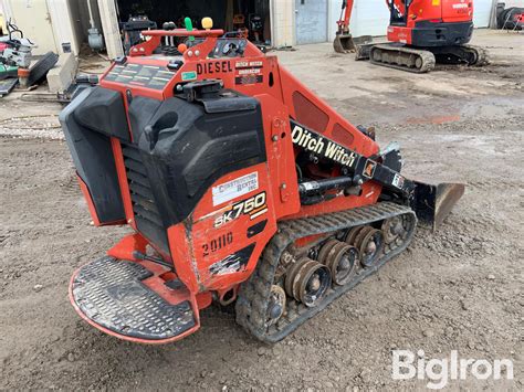 ditch witch sk 750 skid steer walk behind loader|ditch witch stand on.